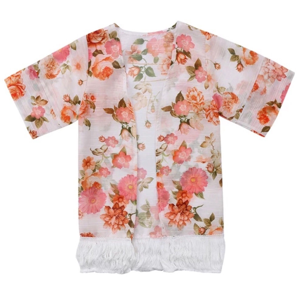 Linen cotton blend kimono with cotton fringe.